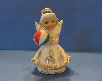 Norcrest August Angel Holds a Beach Ball with Red and Green Stripes - She Has Wonderful Spaghetti Trim and Gold Halo