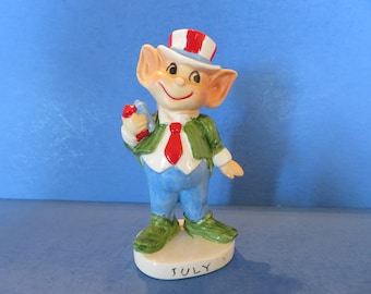 Vintage Japan July Pixie Boy - He Wears Patriotic Hat and Holds a Fist Full of Firecrackers - Wonderful Vintage!