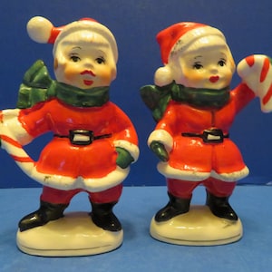 Vintage Japan Santa Girls in Santa Suit Set of Two - Each Holds a Candy Cane and Wears a Green Scraf Blowing in the Breeze - Excellent!