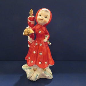 Vintage Japan Christmas Girl Wears Rhinestone Embellished Dress - Holds Candy Cane and Bells on Holly Base with Huge Christmas Candle