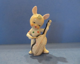 Norcrest Easter Boy Wearing a Red and Green Polka Dot Bunny Suit While Playing a Bass Fiddle - Wonderful and Rare!