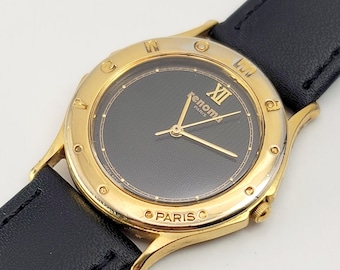 Reloj vintage Renoma (Citizen Mov't) París 6031-003936-Y con esfera negra, unisex.