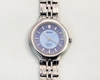 Seiko Exceline 4J41-0070 Titanium HAQ Quartz Ladies Watch Blue MOP