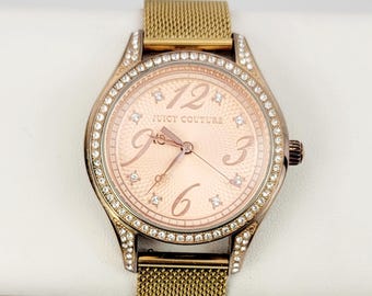Juicy Couture JC.61.3.34.0253S Women’s Rose Gold Pink Dial Rhinestone Watch