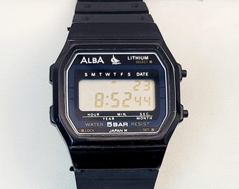 Vintage Seiko Alba V810-5020 Quartz Watch – Yellow Sunburst Dial