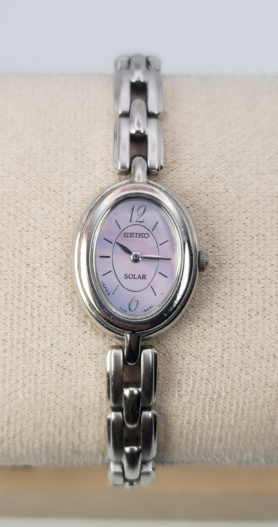 Seiko Solar V110-5A20 Oval Gold-tone Ladies Watch – Purple Dial