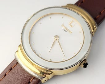 Reloj de mujer vintage Lasserre Paris, tono dorado, esfera blanca, cuarzo TL60