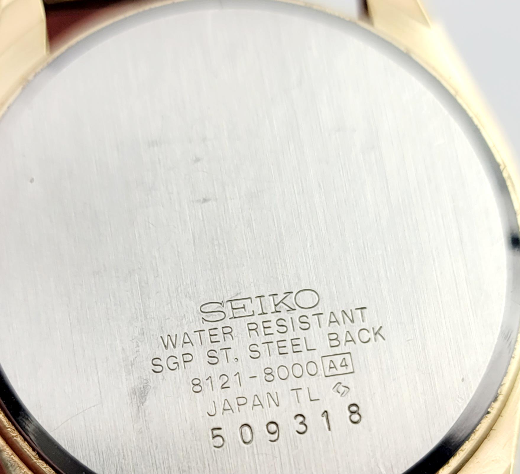 ヴィンテージ セイコー クロノス 8121-8000 クォーツ ドレスウォッチ 