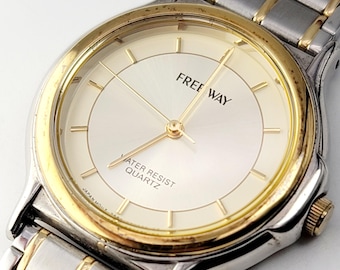 Reloj Citizen Free Way 7680 vintage de cuarzo bicolor de 34 mm, fabricado en Japón, con fecha y día.