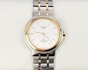 Seiko Solar V110-5A20 Oval Gold-tone Ladies Watch – Purple Dial