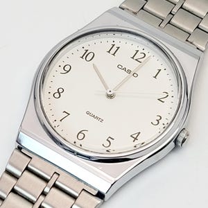 Vintage Casio MQ-336 heren quartzhorloge roestvrij staal witte wijzerplaat Japan 705