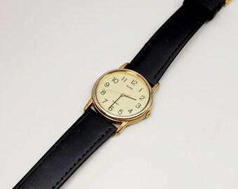 Seiko Alba Y136-6A70 Vintage Gold-tone Watch – White Arabic Dial