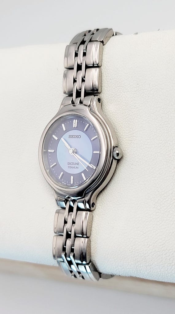 Seiko Exceline 4J41-0070 Titanium HAQ Quartz Ladies Watch Blue MOP