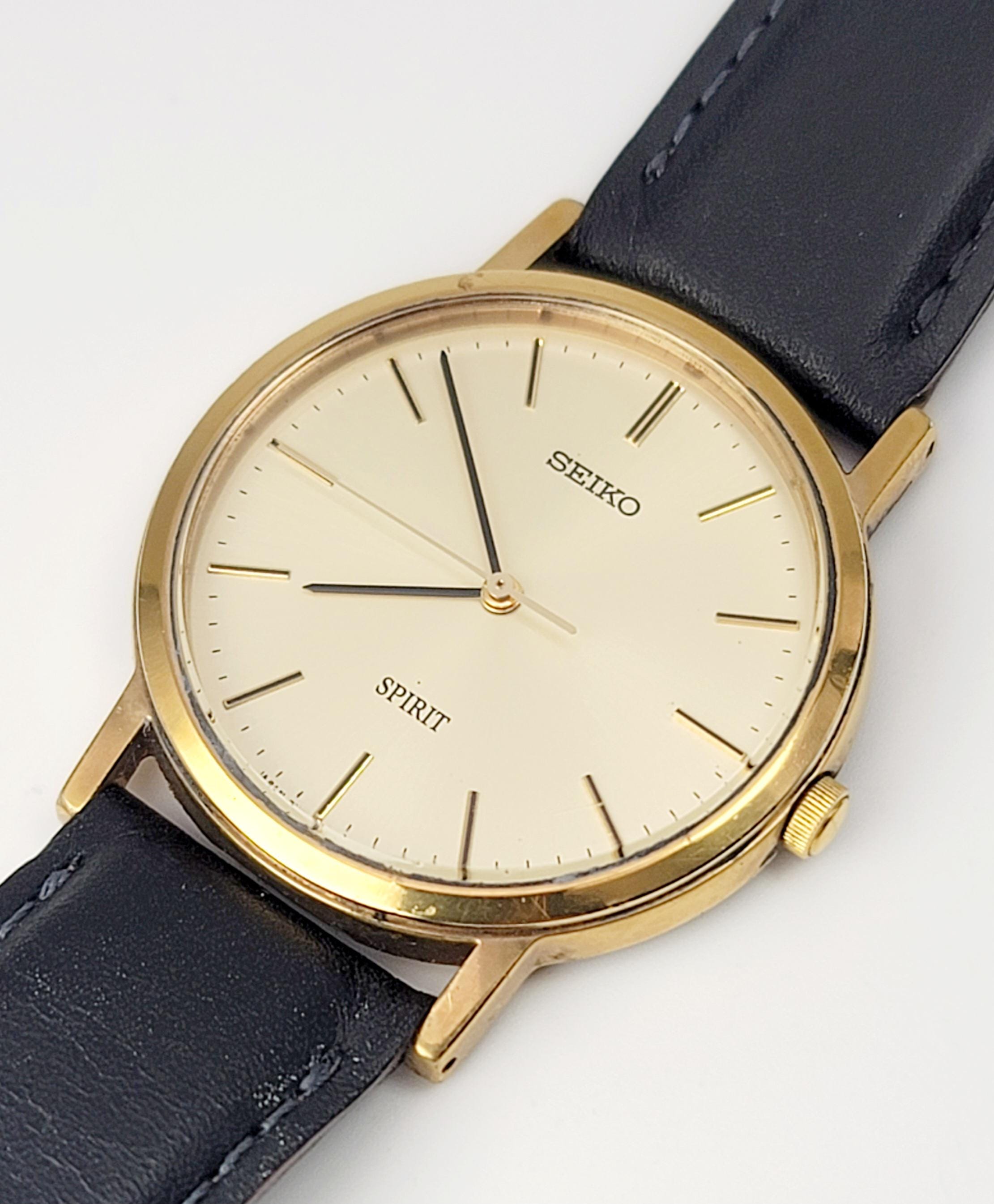 Vintage Seiko Spirit 7N01-7060 JDM Gold Dial Quartz Watch – 34mm 