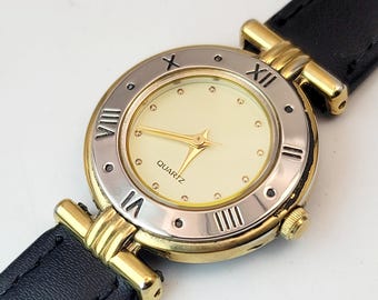 Relógio feminino vintage Noevir 6L32-D872 de quartzo, fabricado no Japão, com bisel romano bicolor.