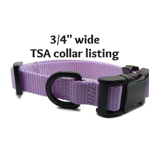 May include: A lavender purple nylon dog collar with a black plastic buckle. The collar is 3/4 inch wide. TSA collar listing.