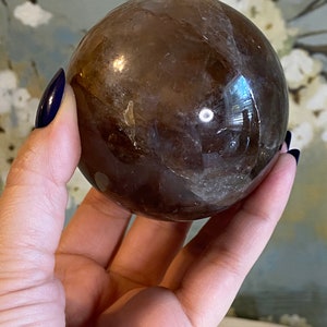 Large hematoid fire quartz sphere