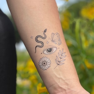 Orignal snake flash tattoo design on @reelskinusa fake skins