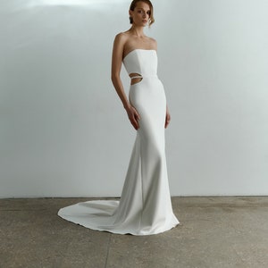 Minimalist cut-out wedding dress Strapless crepe wedding dress Modern fit and flare wedding dress with cutouts Sheath sleeveless gown YVONNE