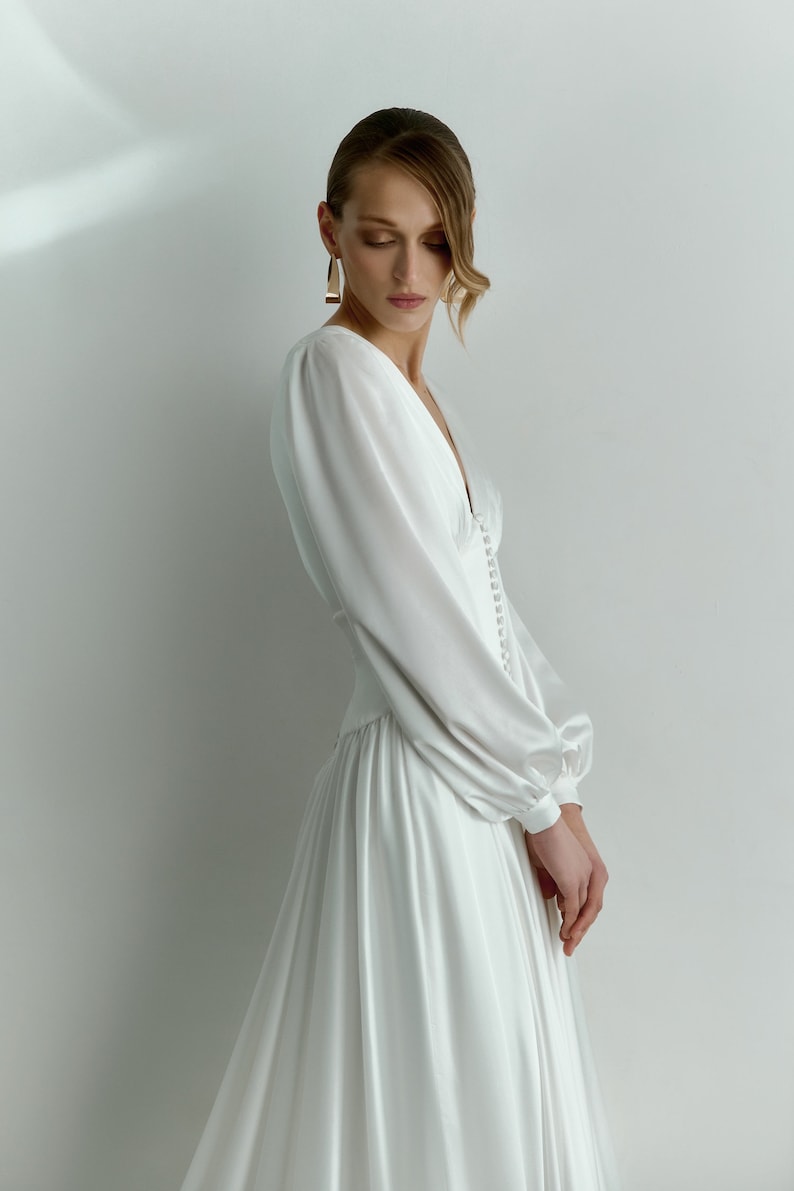 A-neck V-neck long sleeved satin minimalist drag on wedding dress main image 1