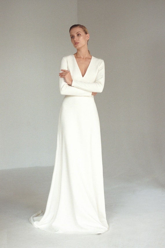 a line long sleeve gown