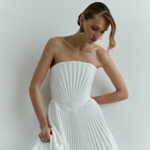 pleated strapless dress
