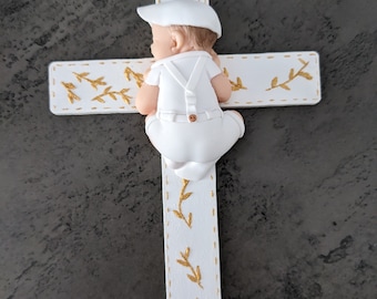 cross plate with miniature baby boy christening clothing