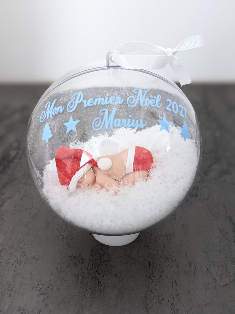 glass ball with baby diaper and miniature Christmas hat my first Christmas to personalize boule plastiq 10 cm