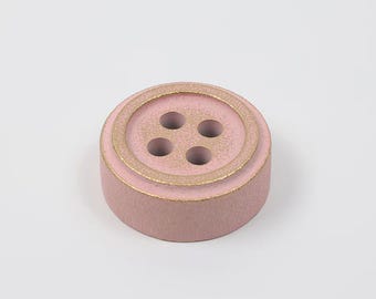 Pisapapeles Cohana hecho de hierro Nambu