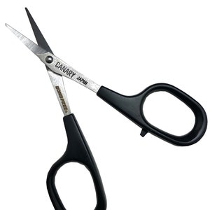 Cutting scissors (with sticky free surface)