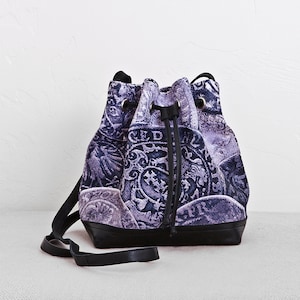 Crossbody pouch style purse, original art work print on poly-canvas, fine natural lamb leather accent details, hand made in United States.