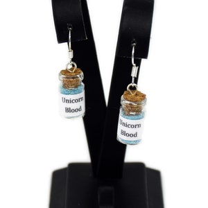 Unicorn blood bottle earrings