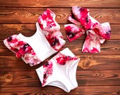 White Two Piece Bathing Suit with Bright Pink Floral Ruff