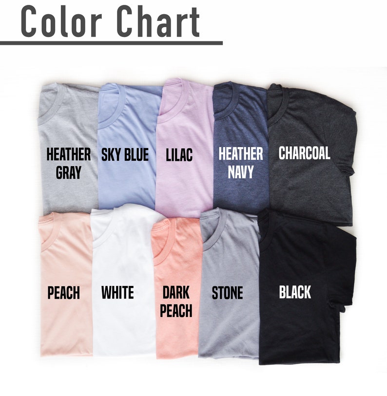 May include: A color chart displaying folded t-shirts in various colors. The colors include heather gray, sky blue, lilac, heather navy, charcoal, peach, white, dark peach, stone, and black. The text "Color Chart" is at the top.