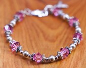 6.75 , Vintage Sterling silver handmade bracelet, 925 beads with pink crystal and breast cancer ribbon charm, stamped 925