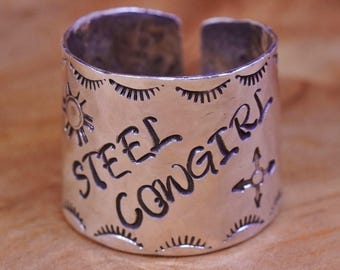 Size 7, vintage Navajo Sterling silver handmade ring, wide 925 band embossed “steel cowgirl”, stamped 925