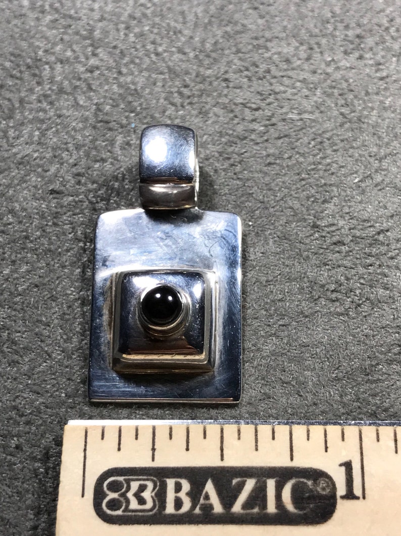 solid 925 silver stamped 925 Vintage 320257 silpada Sterling silver pendant with obsidian inlay