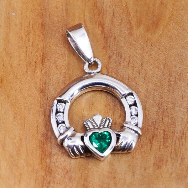 Vintage Ireland sterling silver handmade claddagh pendant, holding heart 925 charm with peridot, stamped 925