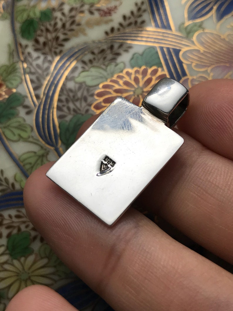 solid 925 silver stamped 925 Vintage 320257 silpada Sterling silver pendant with obsidian inlay