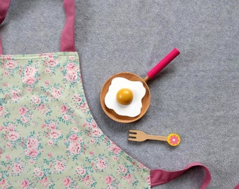 Cheerful, handmade kitchen apron for children Lieke