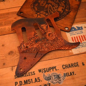 Custom Pickguard for Stratocaster - Leather Unique Stratocaster Pickguard With Carved Train In Brown With Black Shading