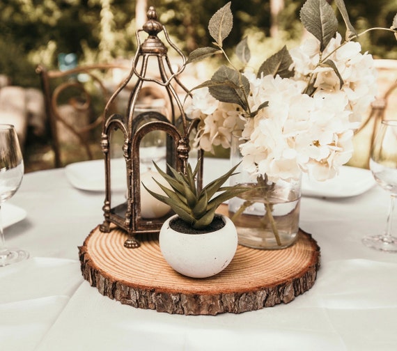 Centerpieces with Candles on Wood Slabs