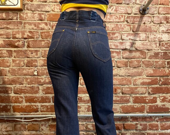 dark denim trousers