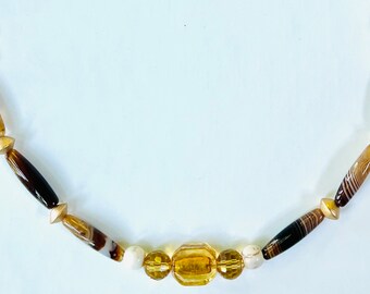 Black and Amber beads with ivory howlite make this beautiful necklace.
