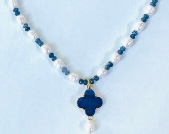 Pearl and blue quartz faceted beads are strung to show this blue lucite clover with a drop pearl.