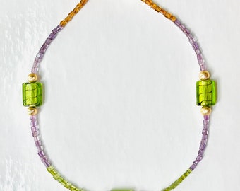 Beautiful tourmaline stones with Murano glass beads.