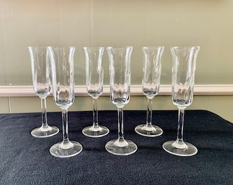 Swirl Optic Clear Champagne Glasses.