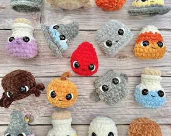 May include: A collection of 15 crocheted Halloween-themed amigurumi toys. The toys include a ghost, a pumpkin, a witch's hat, a candy corn, a spider, a potion bottle, and a heart. The toys are all made with different colors of yarn and have cute faces.