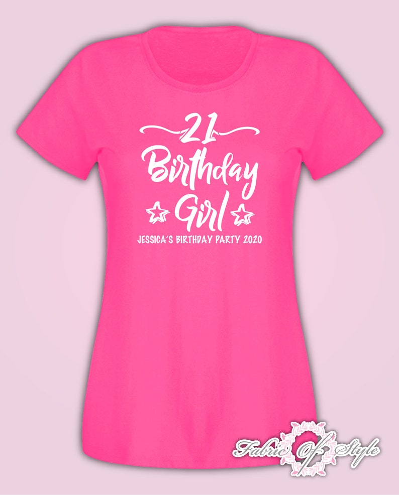 May include: Pink t-shirt with white text that says "21 Birthday Girl" with two stars on either side of the word "Girl". The text below says "Jessica's Birthday Party 2020".