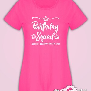 May include: Pink t-shirt with white text that says "Birthday Squad" with stars and the text "Jessica's Birthday Party 2020".